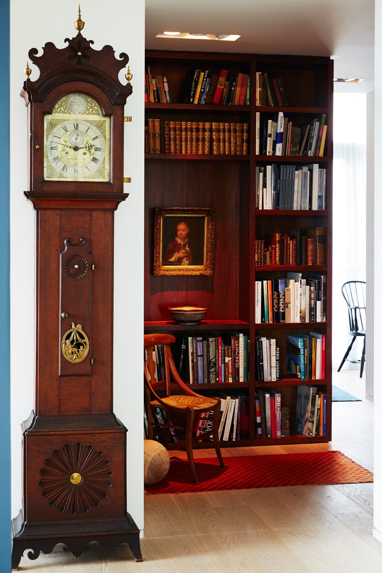 designer Tom Deacon walnut-clad book shelves
