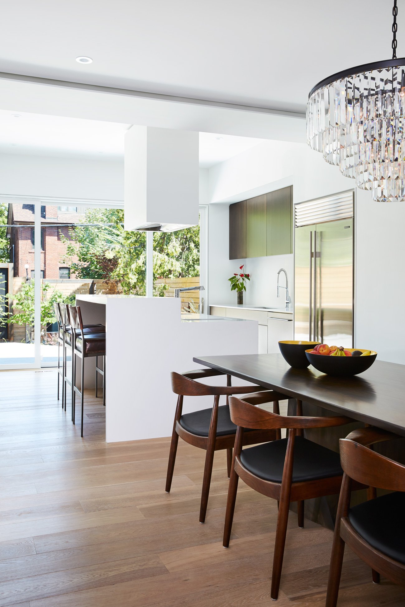 Luc Bouliane designed a quartz-topped island (by SevernWoods) with angles to match the new addition. 